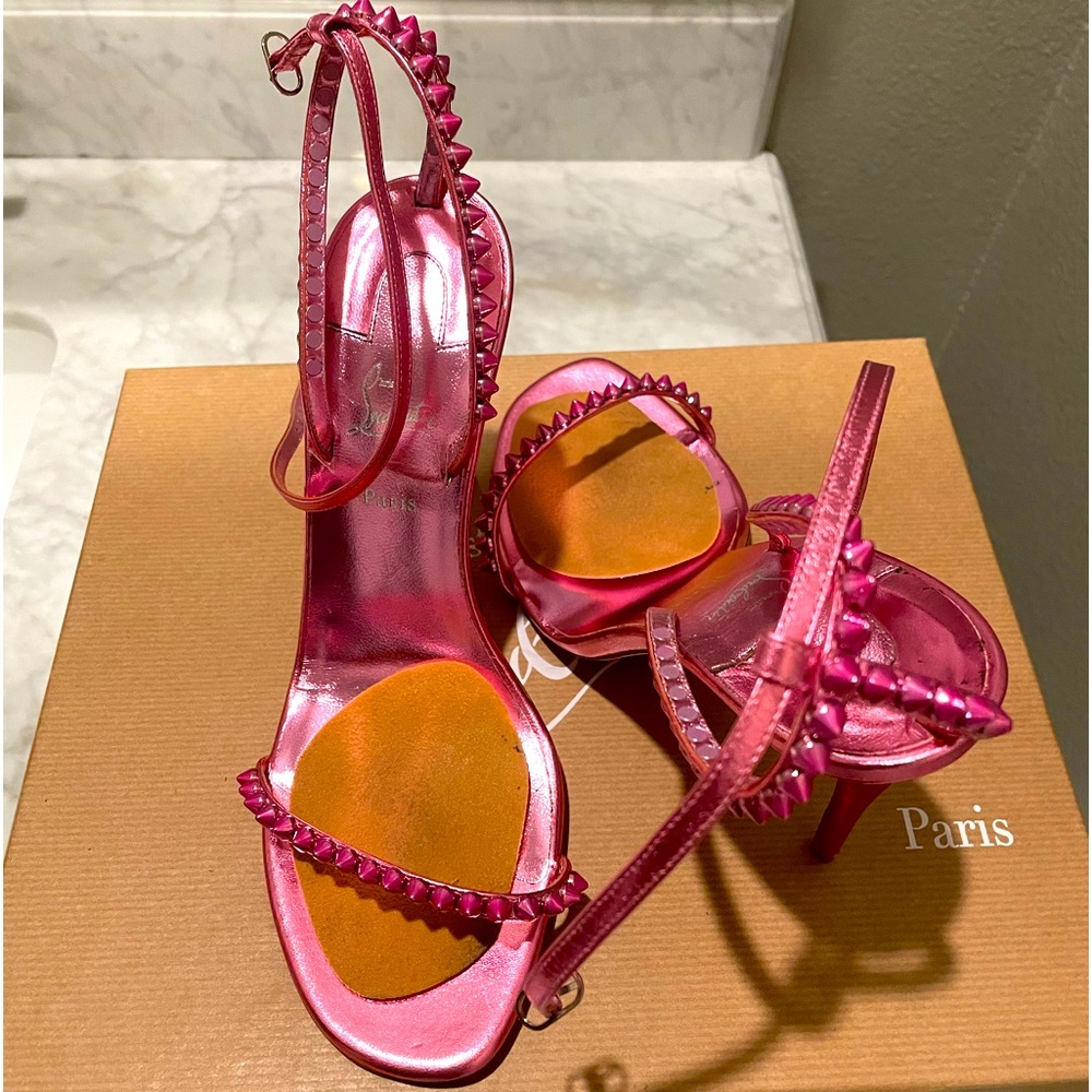 Super cute pink Louboutin heels with spikes. Worn once.